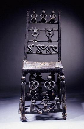 A Fine Chokwe Chair Carved With Various Figures