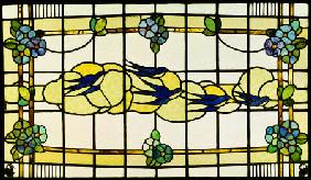 An Arts And Crafts Leaded And Stained Glass Panel Of A Group Of Swallows Before Clouds In A Border O