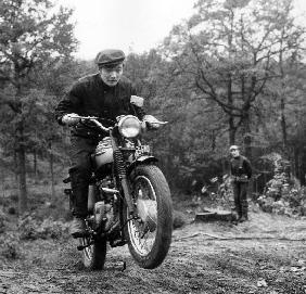 French Singer Ricet Barrier on a moto