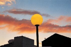 Late sunset on summer evening yellow street-light, Berne (photo) 