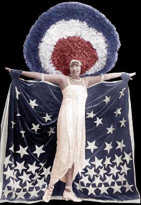 Mistinguett wearing giant headgear in her show in Paris