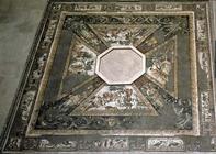 Mosaic pavement based round an octagonal basin, depicting the seasons and hunting scenes, from the C