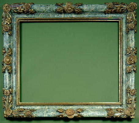 North Italian carved and gilded frame, the marblised ovolo profile carved to the corners and centres à 