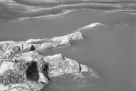 Rock in sea water II (b/w photo) 