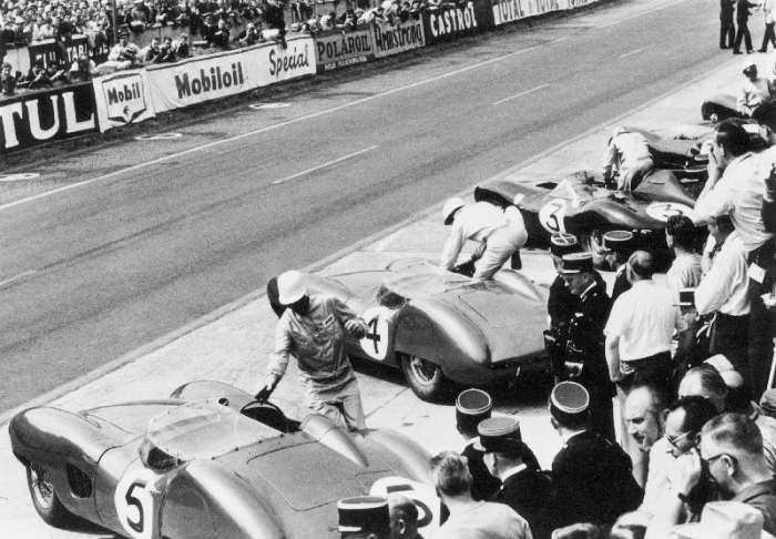 Start of the Le Mans 24 Hours, France, 1959. Roy Salvadori prepares to climb aboard his Aston Martin à 