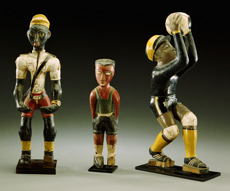 Three Male Carved Figures, One Wearing An Official''s Uniform, The Other Two In Sports Gear à 