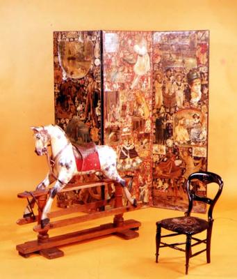 Victorian Nursery furnishings. Late 19th century rocking horse, mid-19th century scrapwork screen an à 