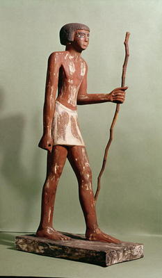 Model of an official (painted wood) à Old Kingdom Egyptian