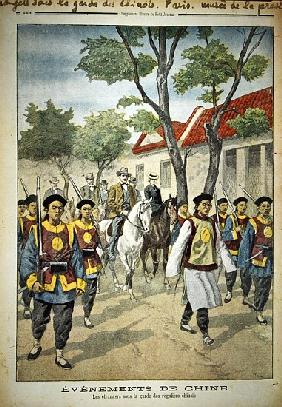 European foreigners under armed escort Chinese regular soldiers during the Boxer rebellion of 1899-1