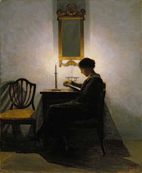 Woman reading by candlelight à Peter Vilhelm Ilsted