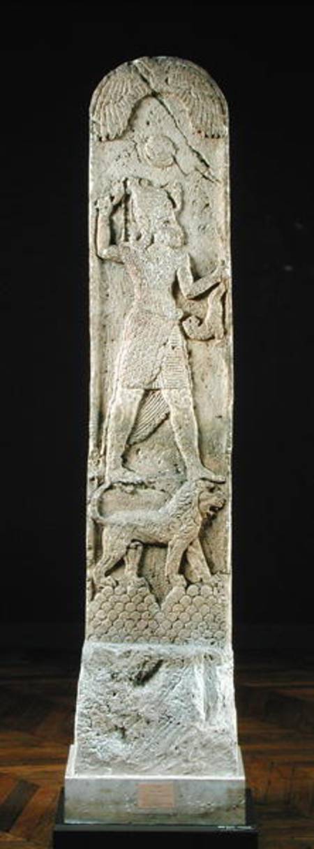 Votive stela depicting a god standing on a lion, from Amrith à École phénicienne