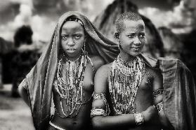 Karo girls sharing a scarf