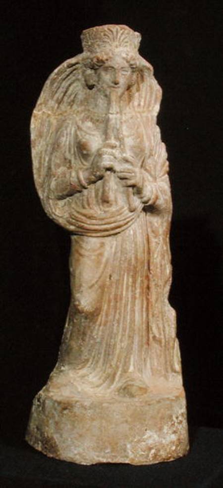 Statuette of a woman playing a double flute, from Tunisia à Punic