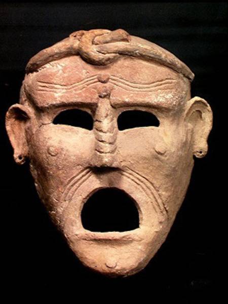 Punic charm mask à Romain