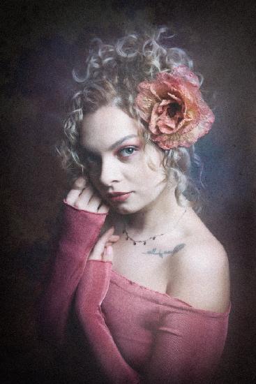 portrait of a young lady with flower in hair