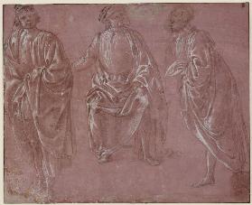 Three garbed figures