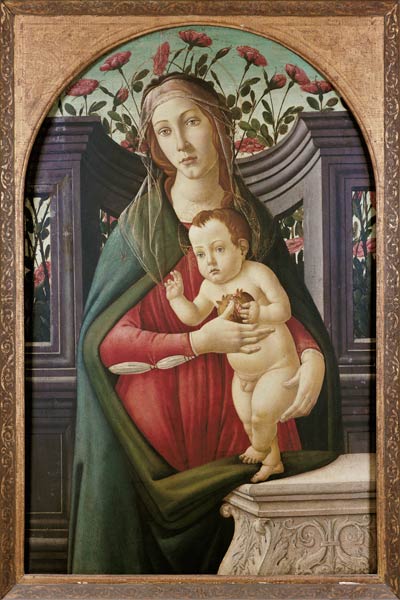 Madonne avec l'enfant dans une alcove décorée de fleurs à Sandro Botticelli