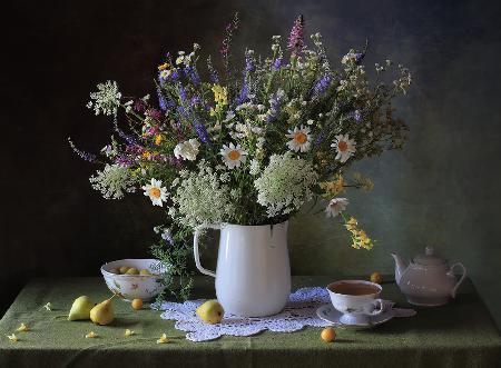 Still life with a bouquet of meadow flowers