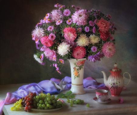 Still life with autumn bouquet and fruits