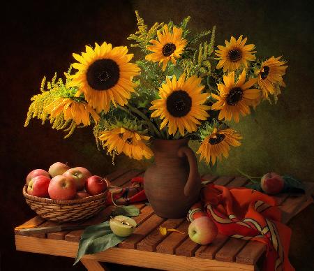 Still life with sunflowers and apples