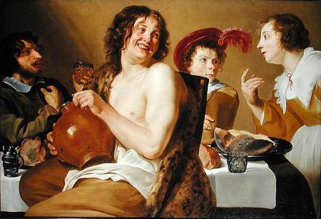 Figures eating and drinking around a table à Theodor Rombouts
