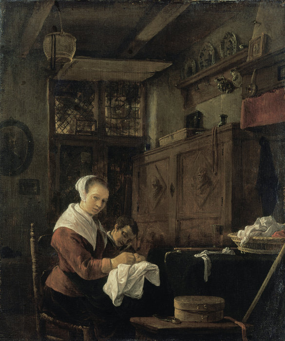 Woman at Her Sewing Table à Thomas Wijck