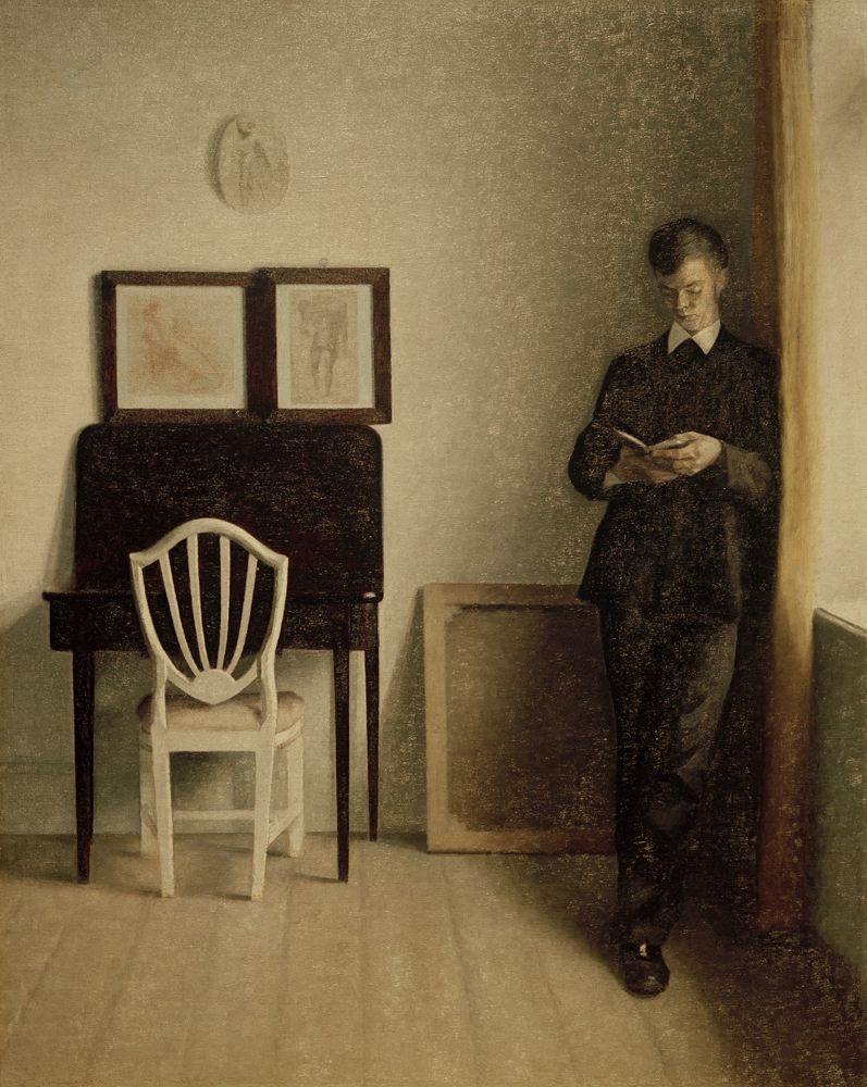 Intérieur avec jeune homme en train de lire à Vilhelm Hammershöi