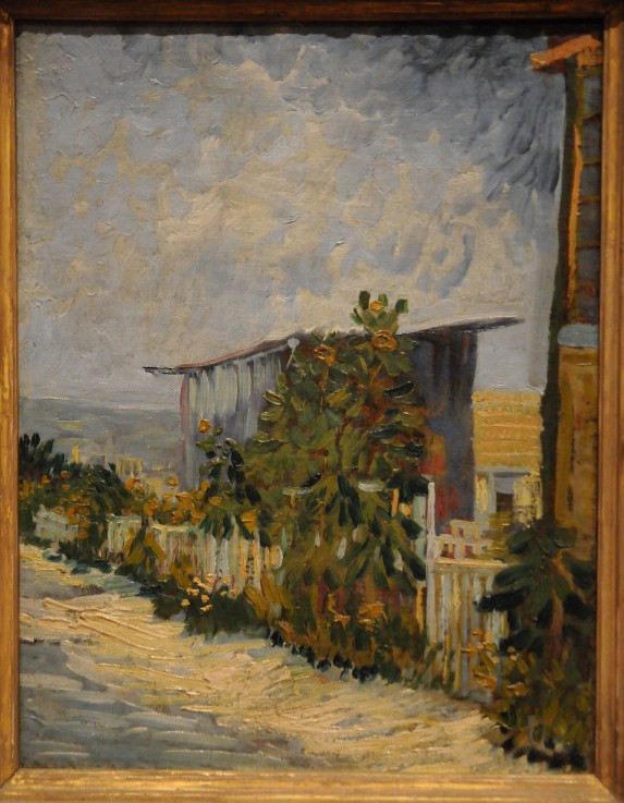 Shed at the Montmartre with sunflower à Vincent van Gogh