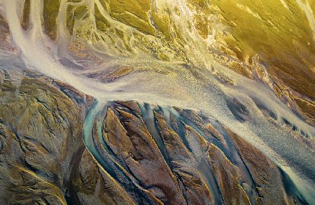 Spectral Serenity: Glacial Rivers at Sunset