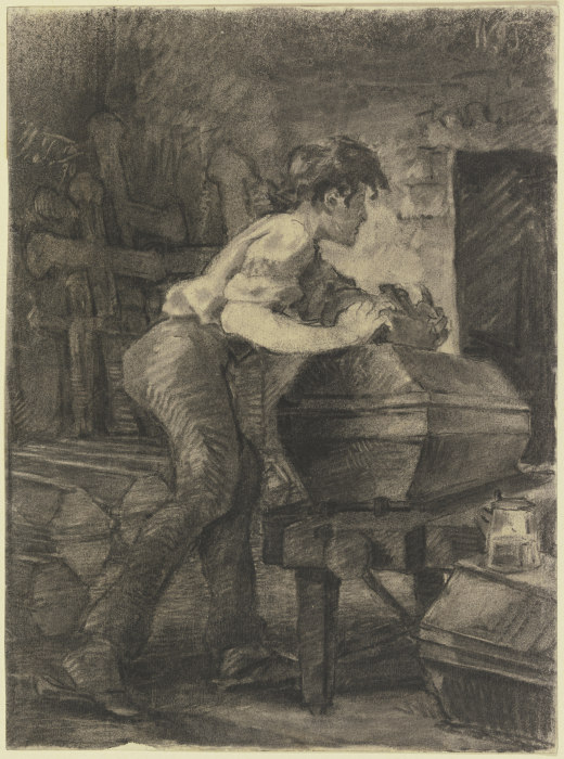 Ein junger Schreiner hobelt in der Werkstatt an einem Sarg à Wilhelm Trübner