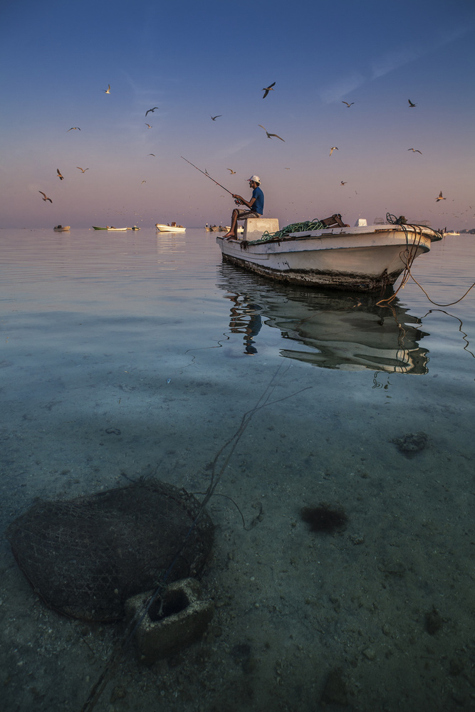 Early Morning Fishing à Zuhair Al Shammaa
